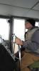 Captain Matthew Thomas at the helm of the Voyageur II - Photo by Captain Ben Silence